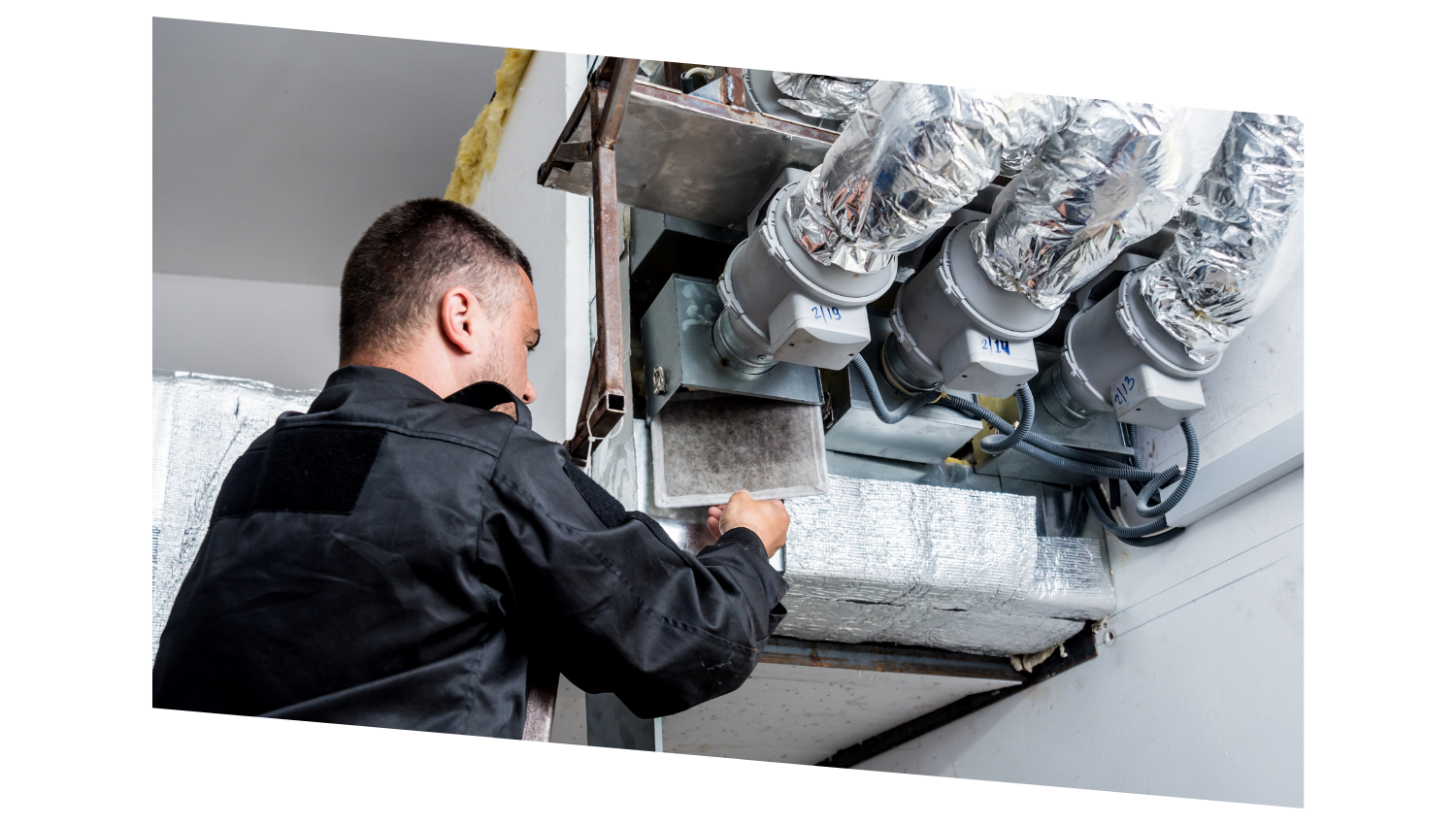 HVAC Technician Changing Out House Filter